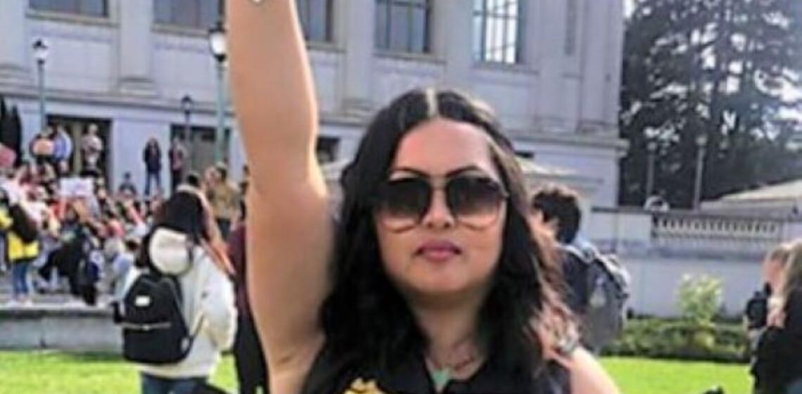 Amy Lo protesting COLA